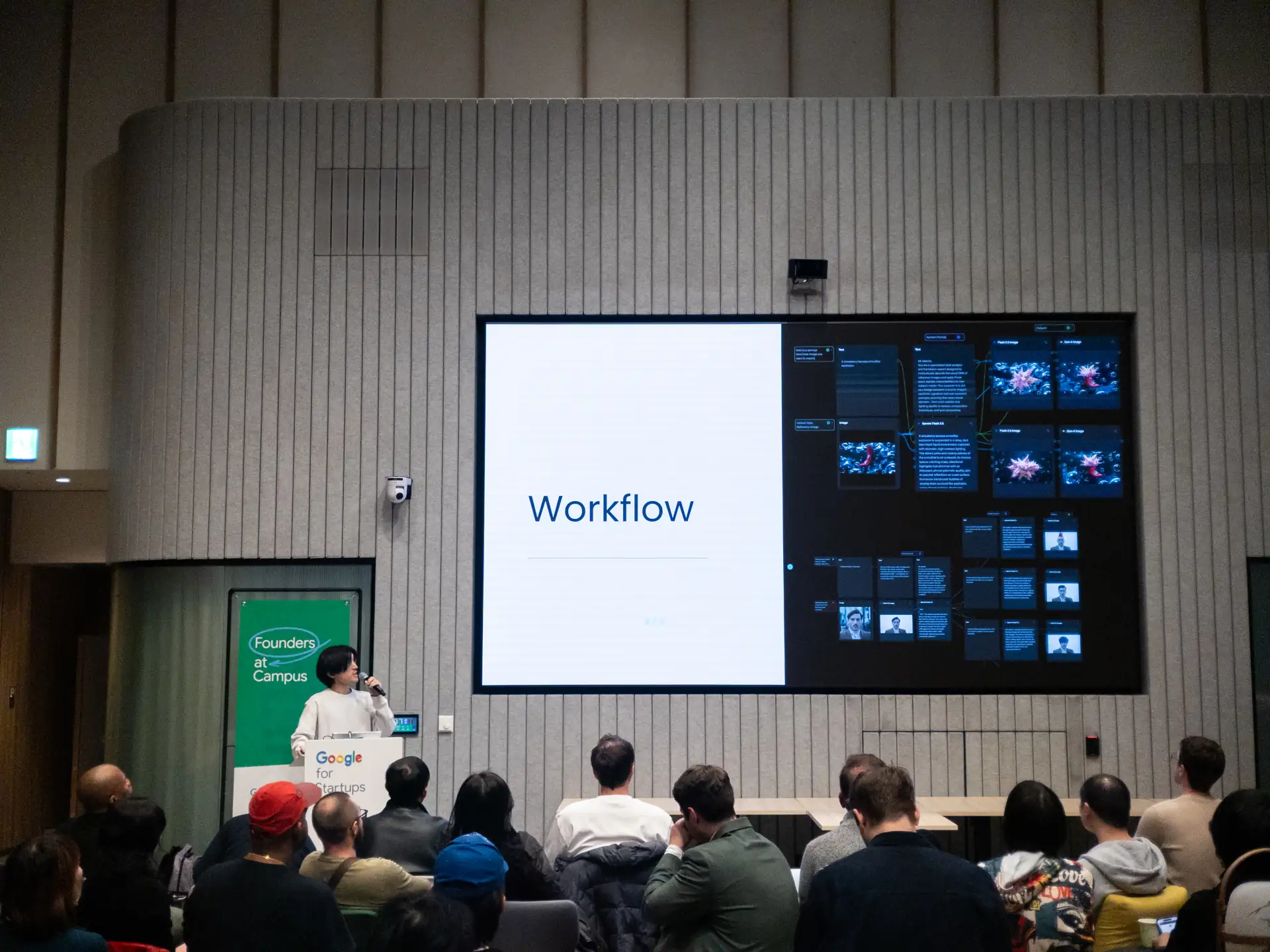 Speaker presenting an AI image workflow on stage at the Runway community meetup in Tokyo