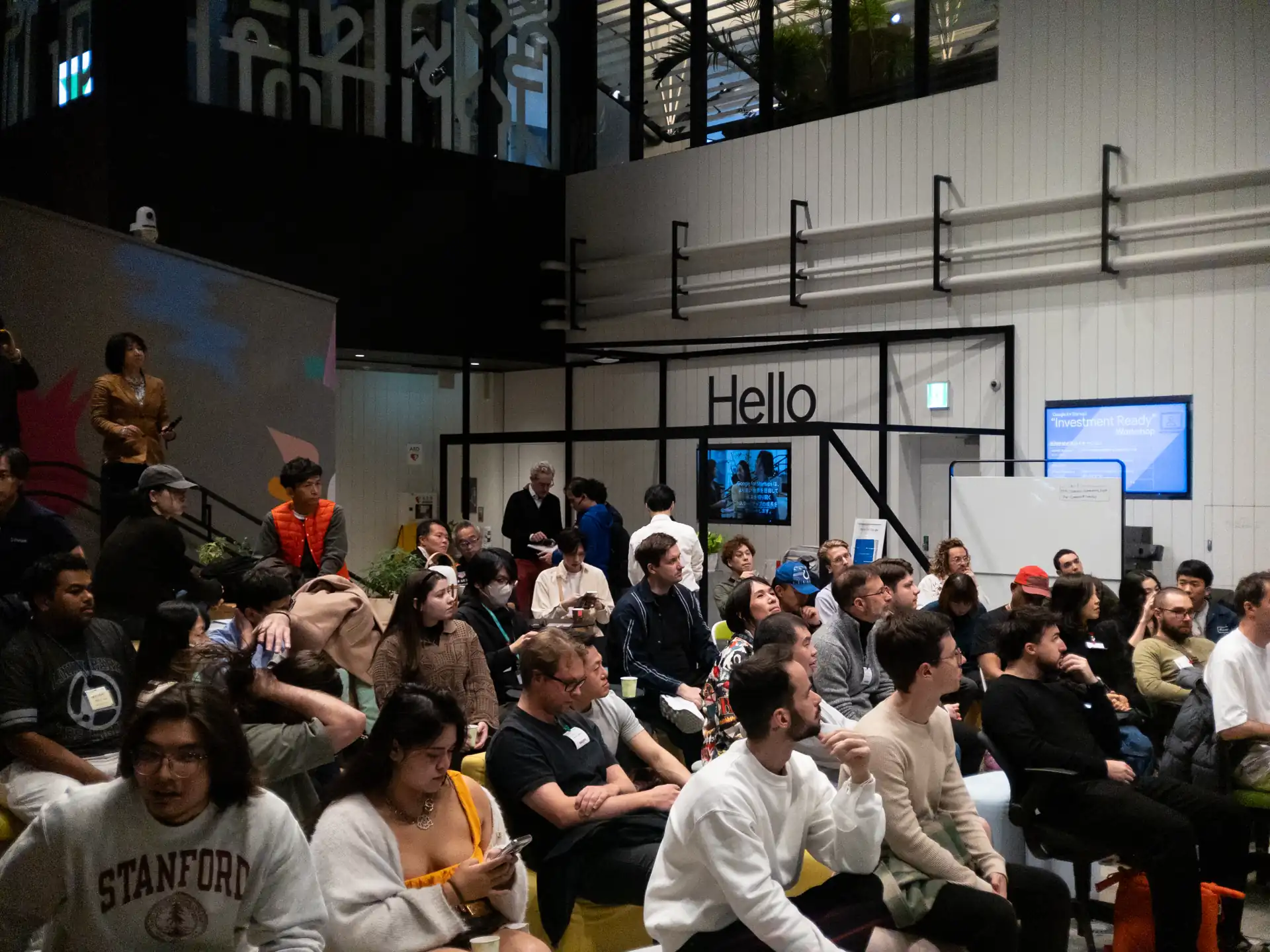 A packed audience at an AIMovieStudio community meetup in Tokyo