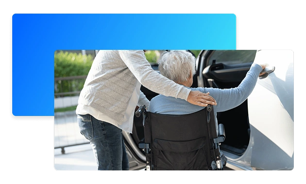 Driver assisting patient into wheelchair lift van
