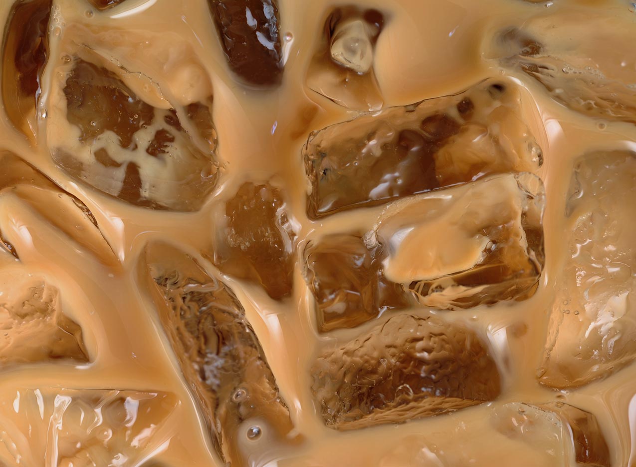 a picture of coffee with ice cubes