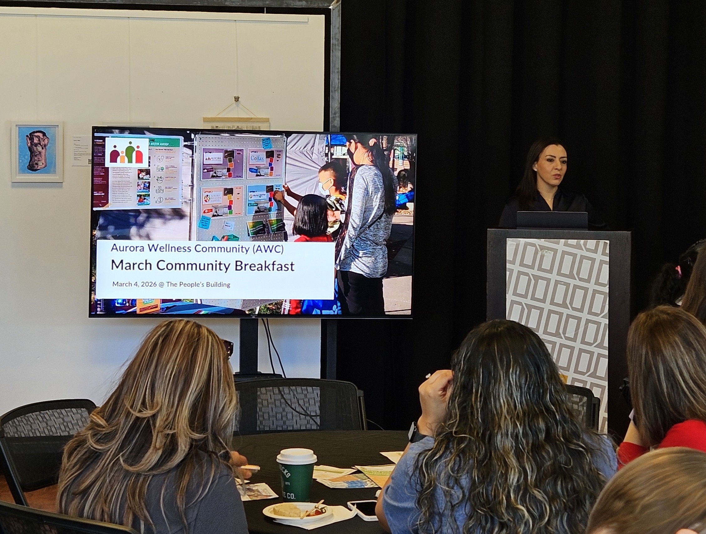 Executive Director presenting at a Community Breakfast