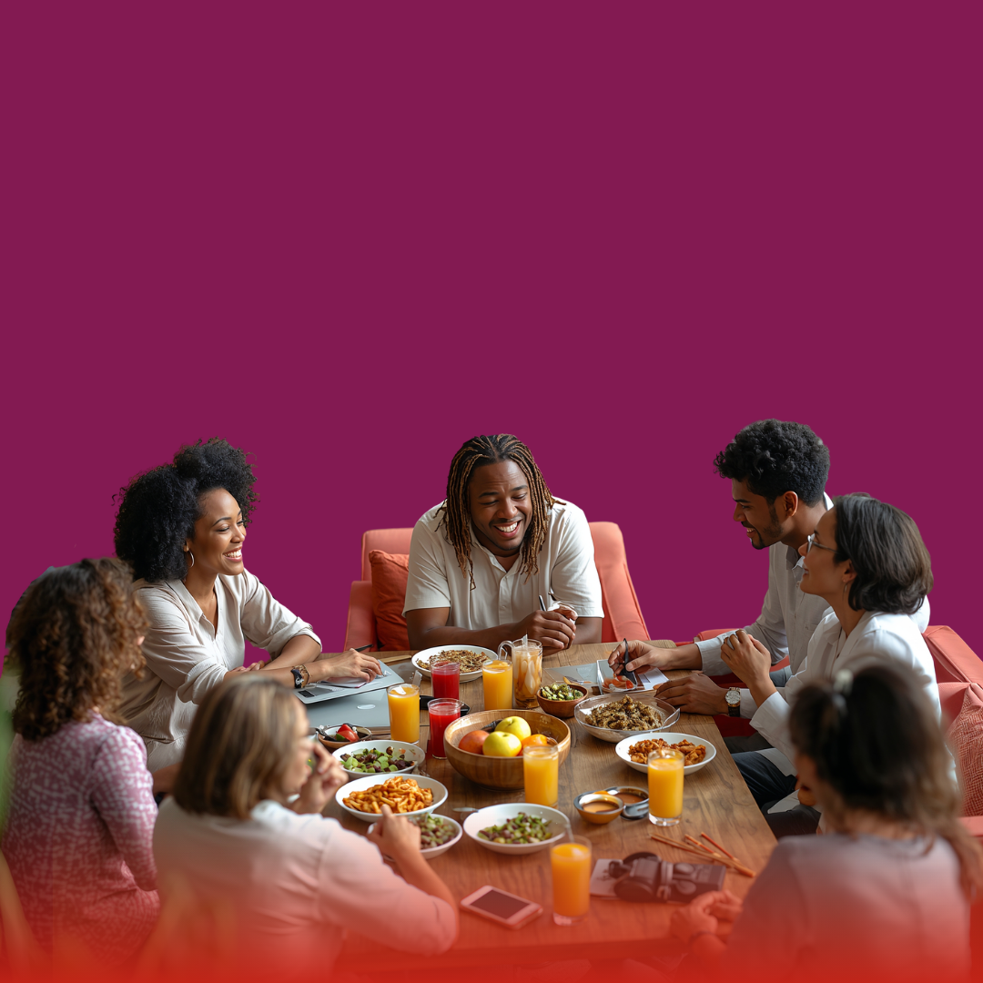 Photo from AWC Breakfast event of community members sitting at a round table talking with each other