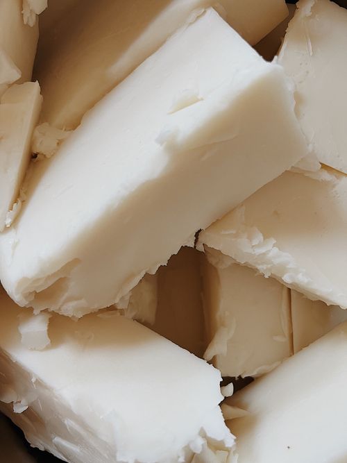 Blocks of coconut wax stacked on each other.