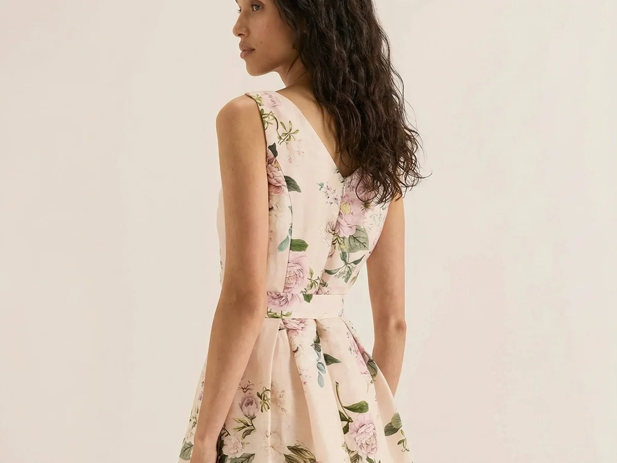 AI virtual model wearing floral mini dress showing fit and drape — Picjam