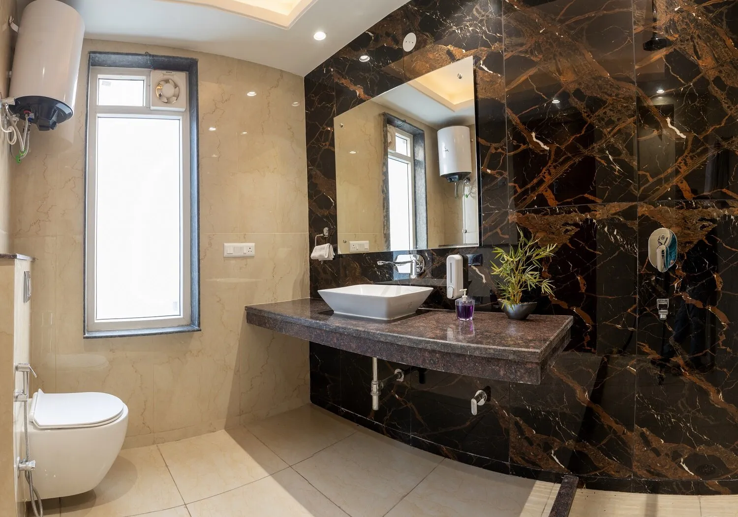 Another view of the luxury bathroom in the room with the fittings and furnhsings as well
