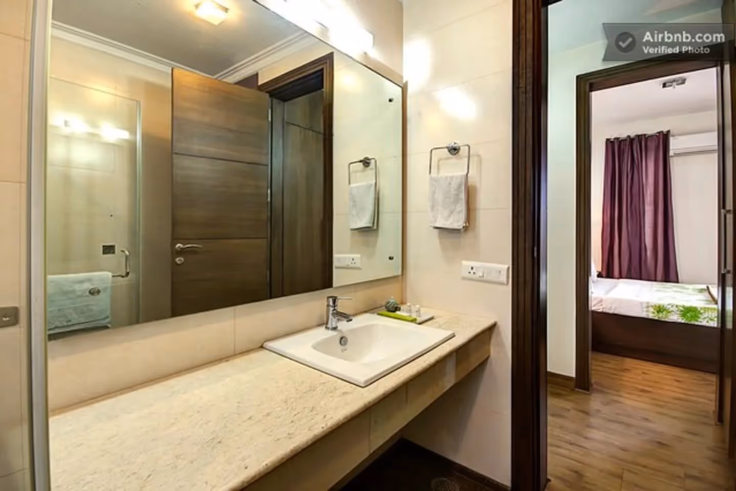 A view from the bathroom of the 2bhk apartment showing the size of the serviced apartment available for long / short term rent. These apartments are available without any lock in, security deposit or fixed lease - ideal for travelers coming to Gurugram