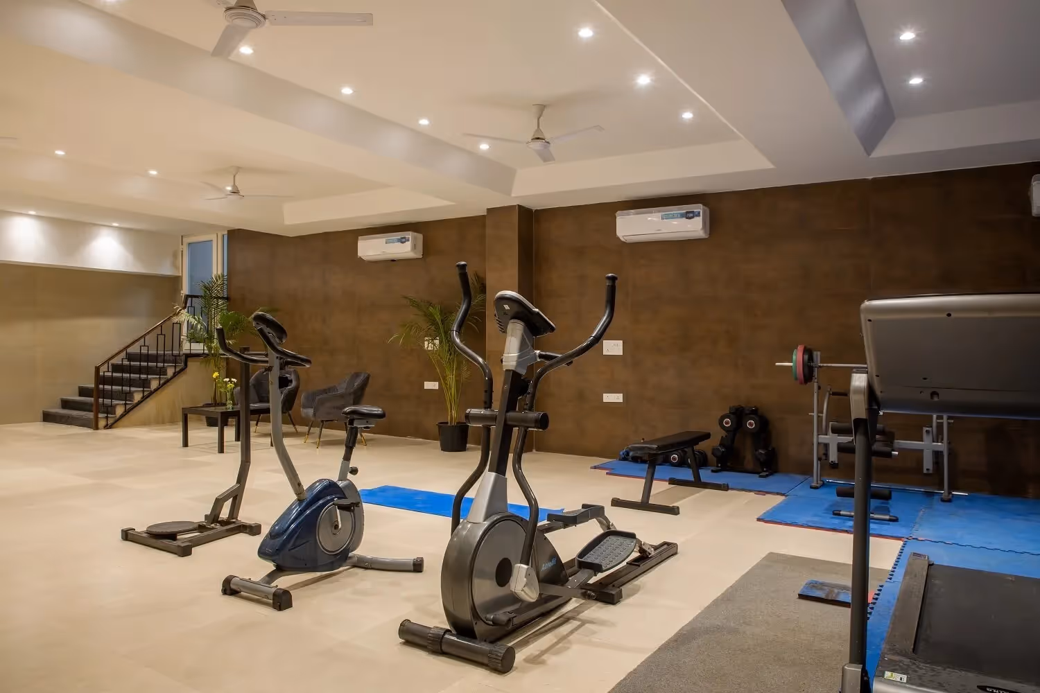 Gym in Perch service apartments dlf cyber city with all the fitness equipment located at the ground floor level - for the convenience of corporate, tourist and family guests