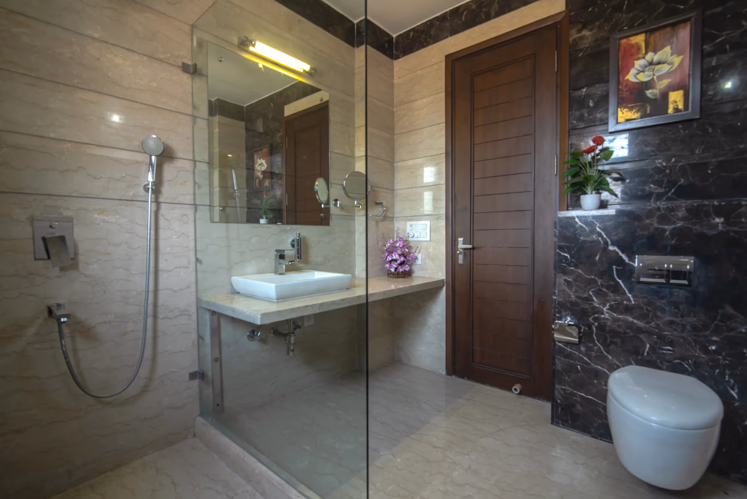 View of one of the bathrooms in the 3BHK service apartments in Central Gurgaon - The serviced apartment has 3 bedrooms and adequete space for families