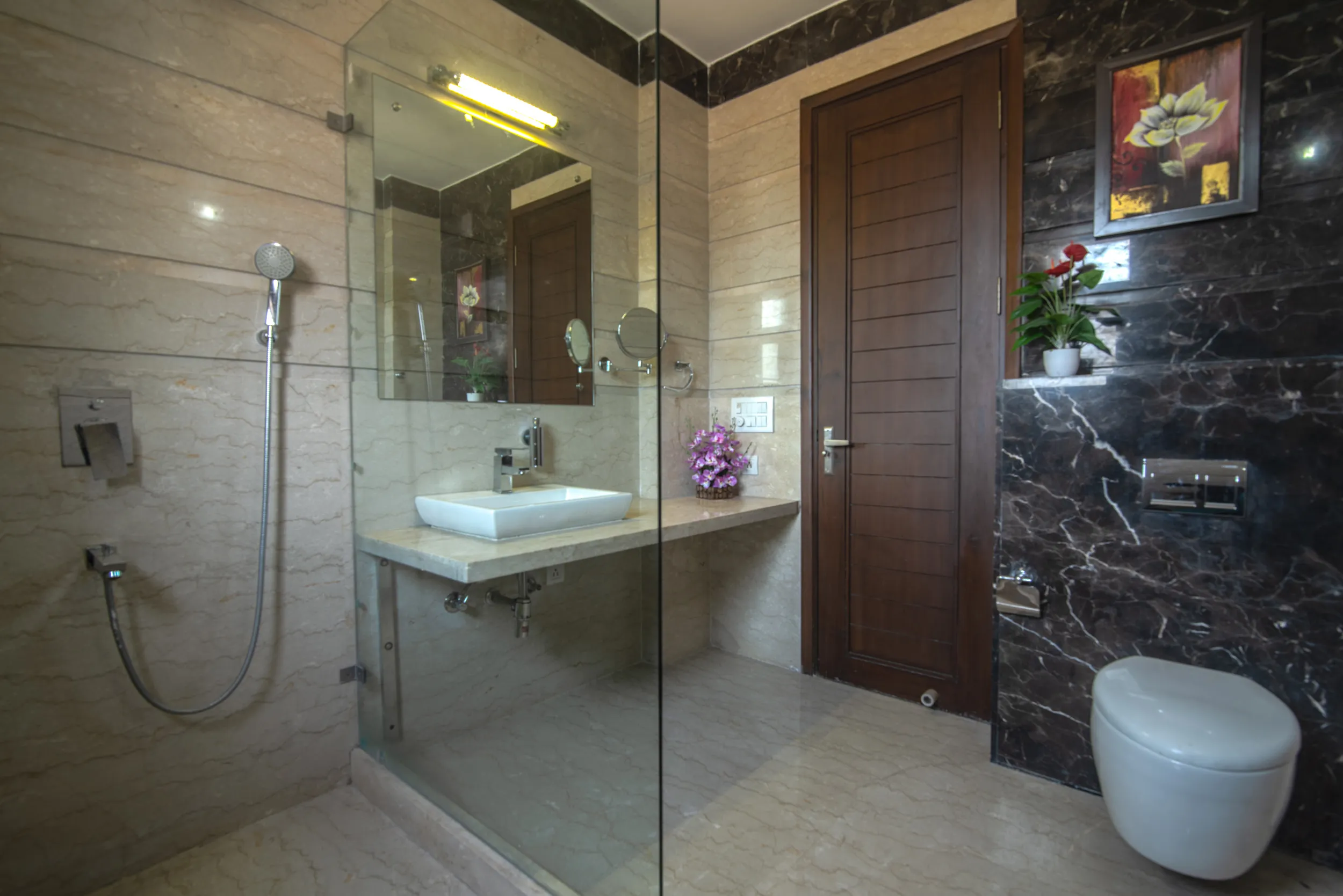 View of one of the bathrooms in the 3BHK service apartments in Central Gurgaon - The serviced apartment has 3 bedrooms and adequete space for families