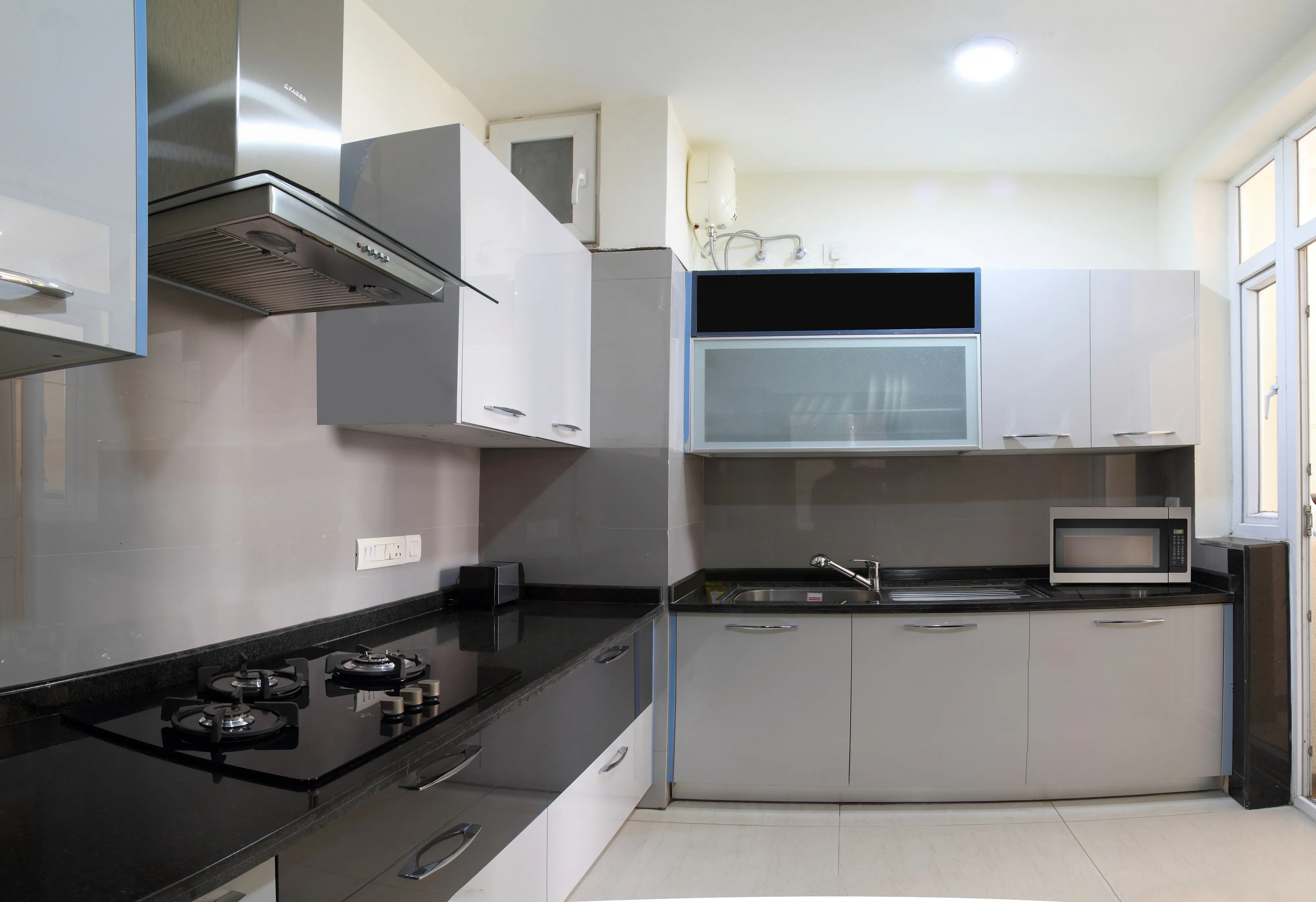 Kitchen view of the 2 bhk service apartment on sohna road from perch