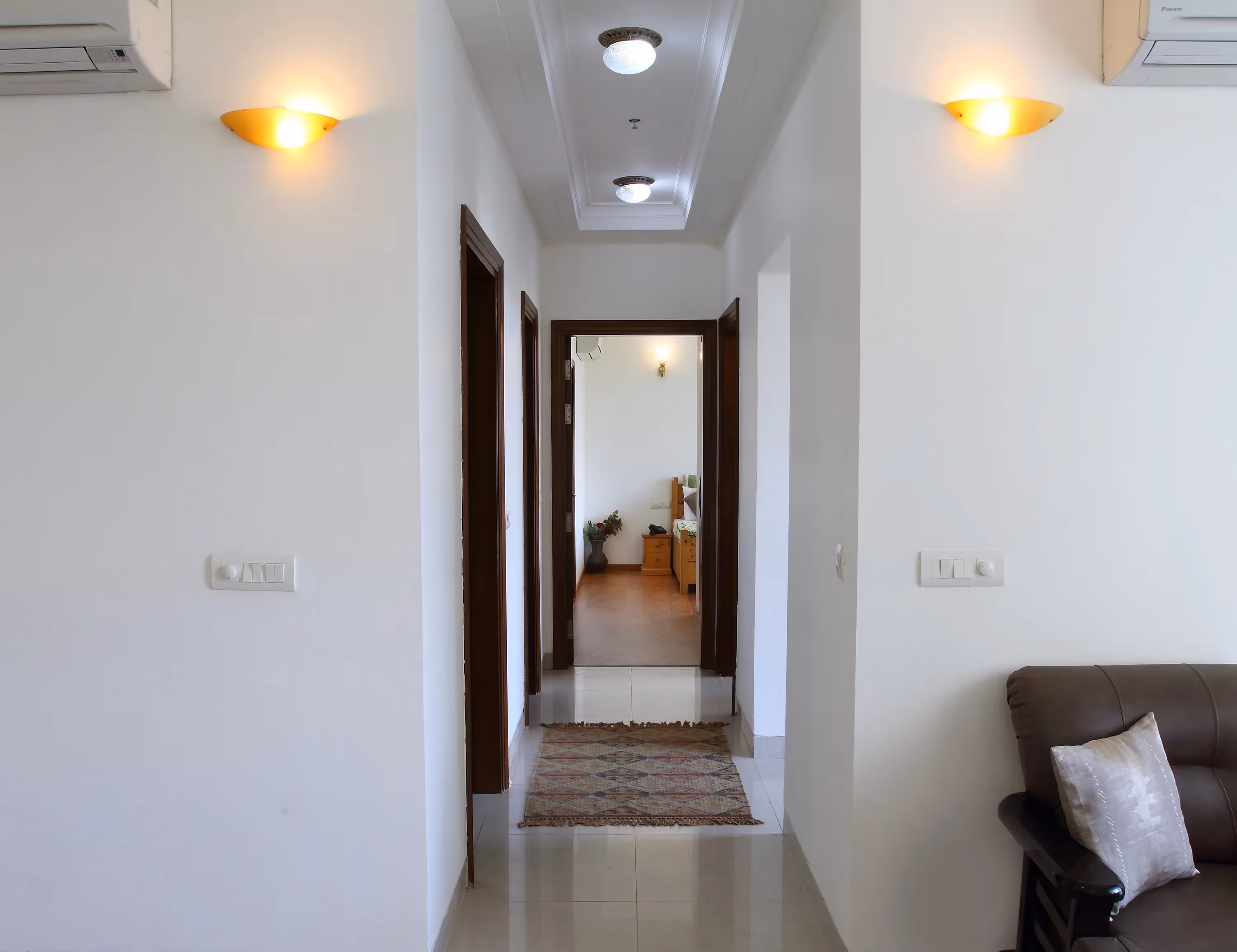 Cross section view of the apartment with the living area, dining and the bedroom - serviced apartments on sohna road from perch