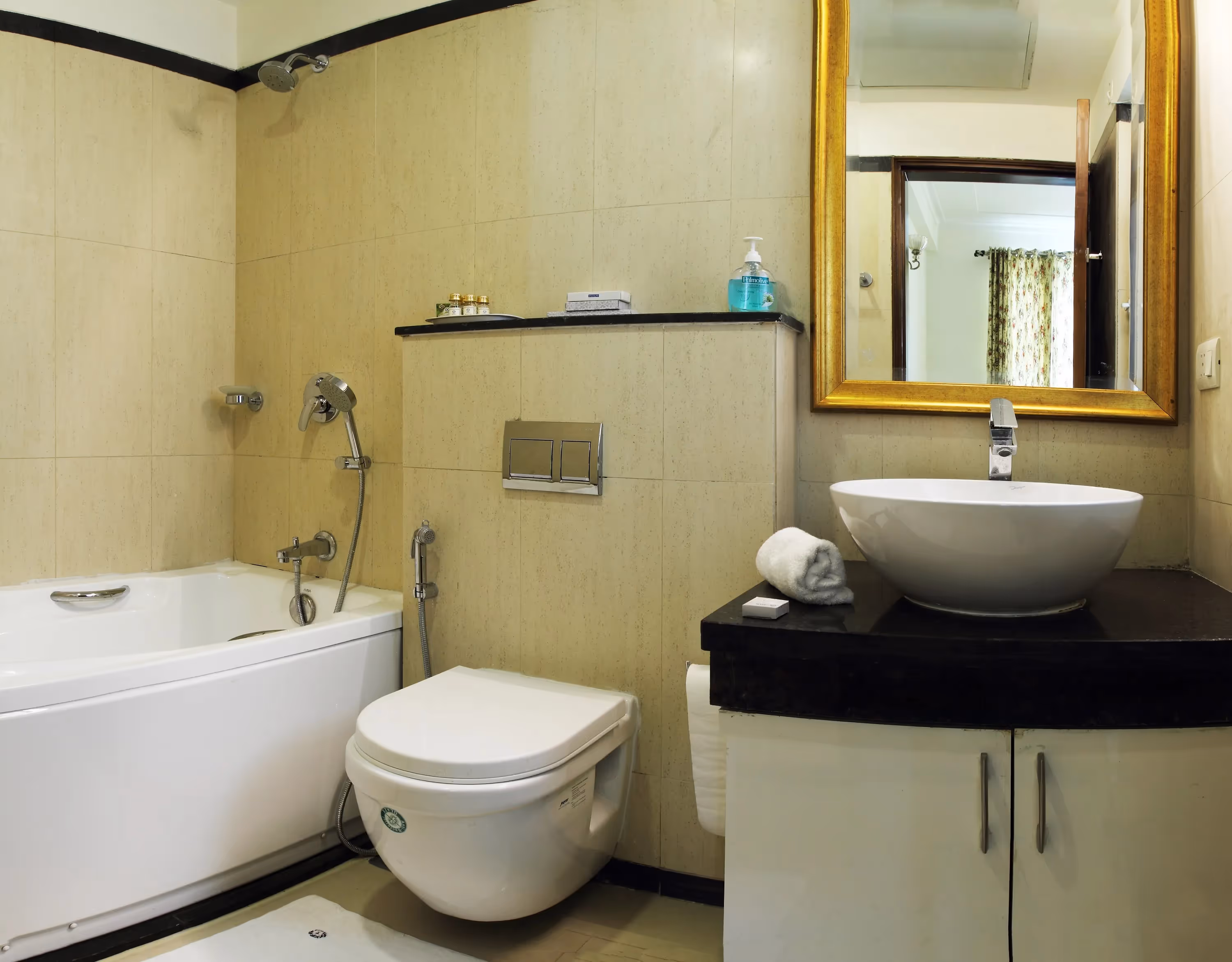 A view of the modern bathroom in the 2 bhk serviced apartment by perch in central park 2 on sohna road