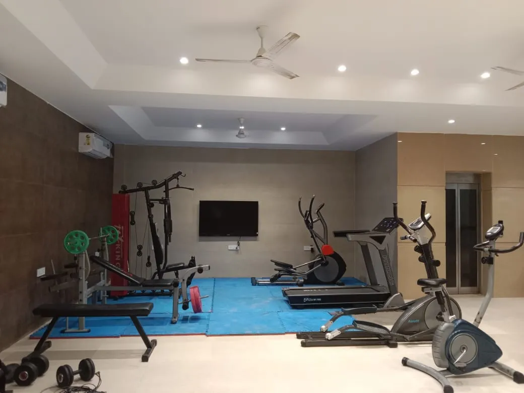 Gym area in the basement of the building with adequete room for the guests to work out and enjoy as well