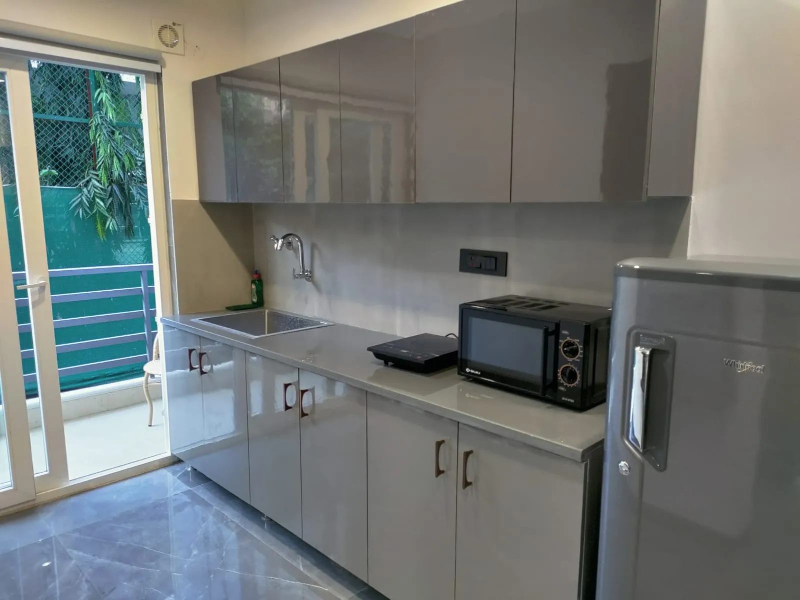 View of the kitchen area in the studios near the DLF Cyber city designed for corporates guests and tourists and social groups