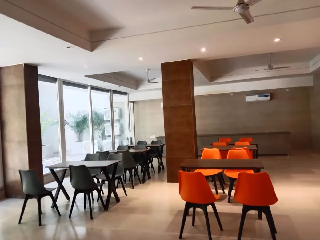 Another view of the basement with adequete seats and dining area as well