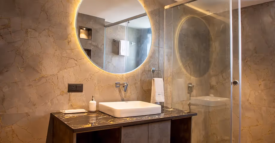 Bathroom at 2BHK in Casa Feliz with spacious layout, stylish fixtures, and stone sink