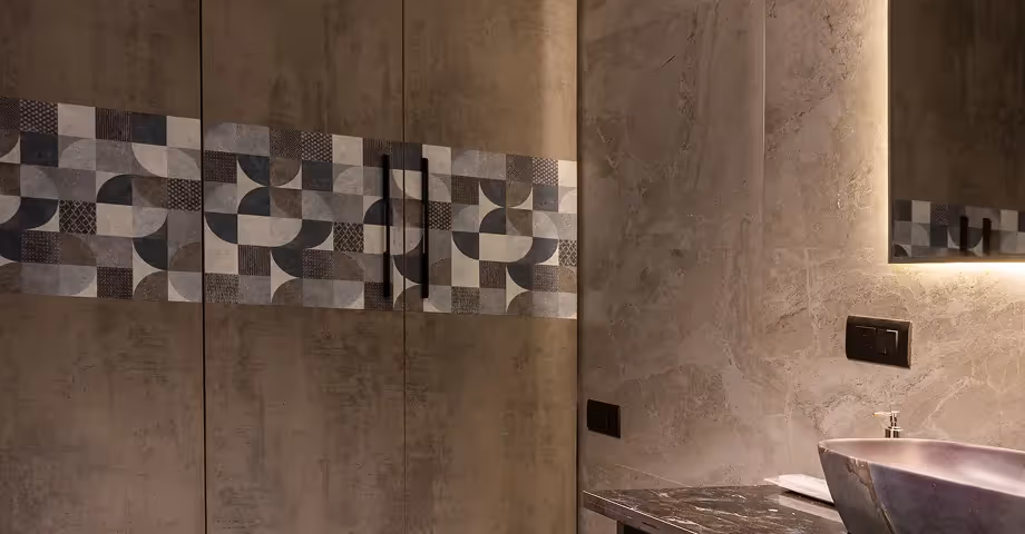 Luxury bathroom at 2BHK in Casa Feliz featuring a modern sink, wall-mounted fixtures..