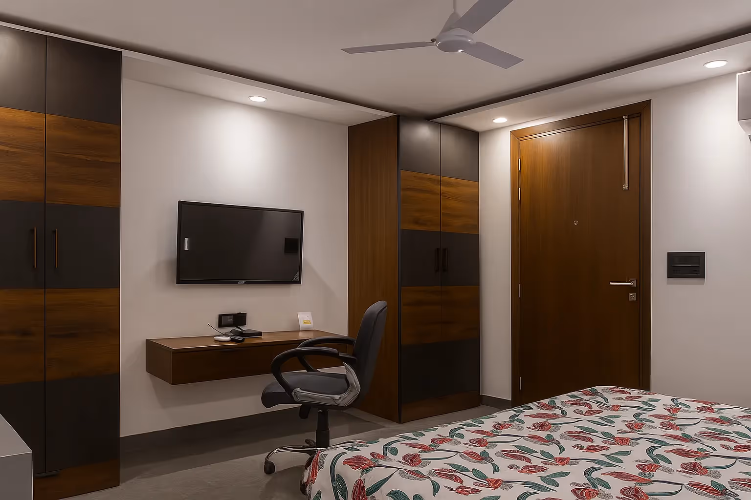 Dedicated work desk and comfortable work area with high-speed Wi-Fi, ample lighting, power outlets, and ergonomic seating—perfect for remote work or business travelers.