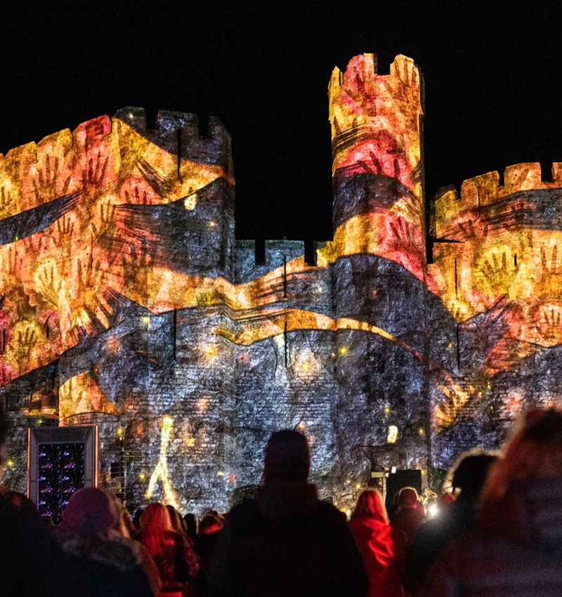 Imsge from art installation of projection of visuals on a building