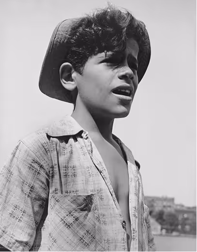 Young boy in a cowboy hat looking off camera – Throwback Thursday photo.