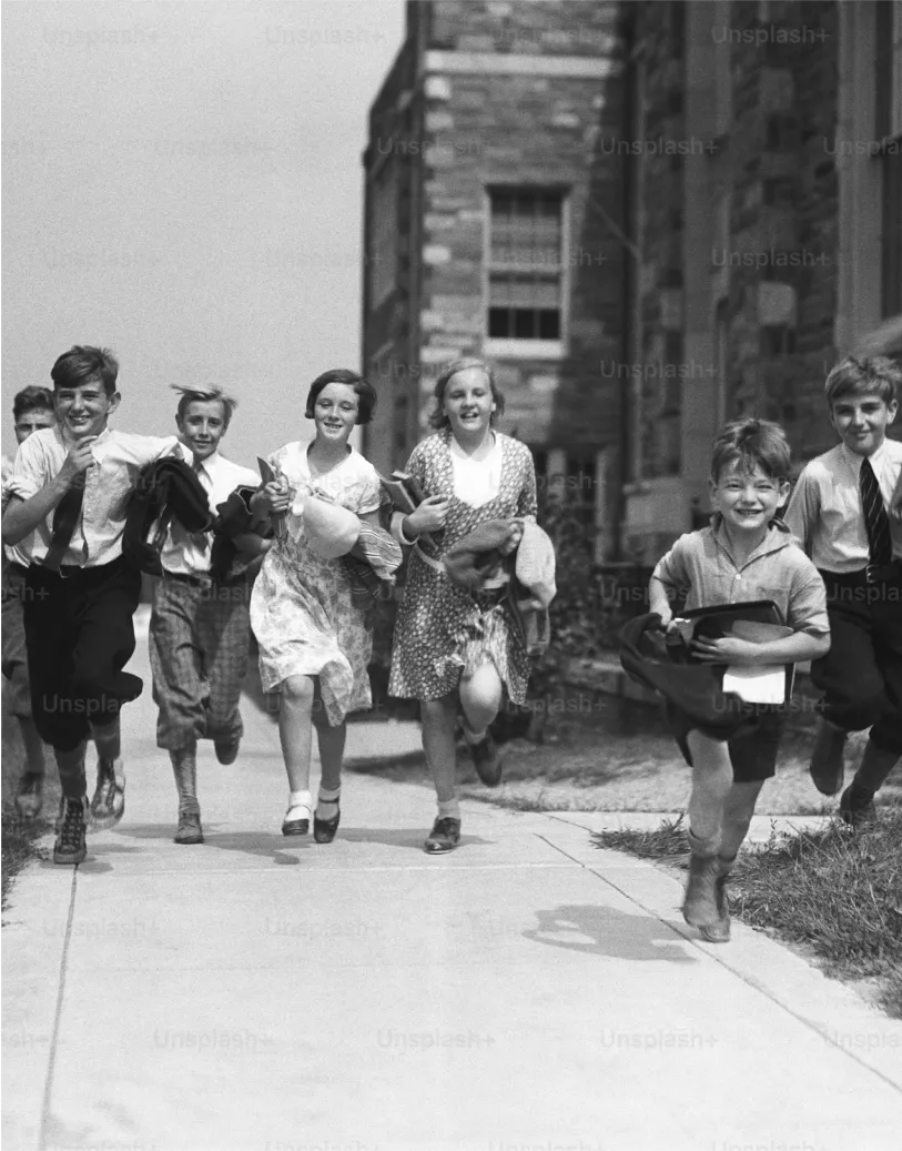 Vintage black-and-white photo of people running in a street race – Throwback Thursday photo.