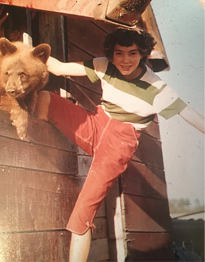 Girl climbing a wooden play structure outdoors – Throwback Thursday photo