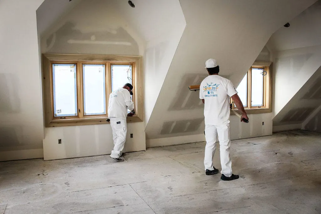 painters preparing a room for painting