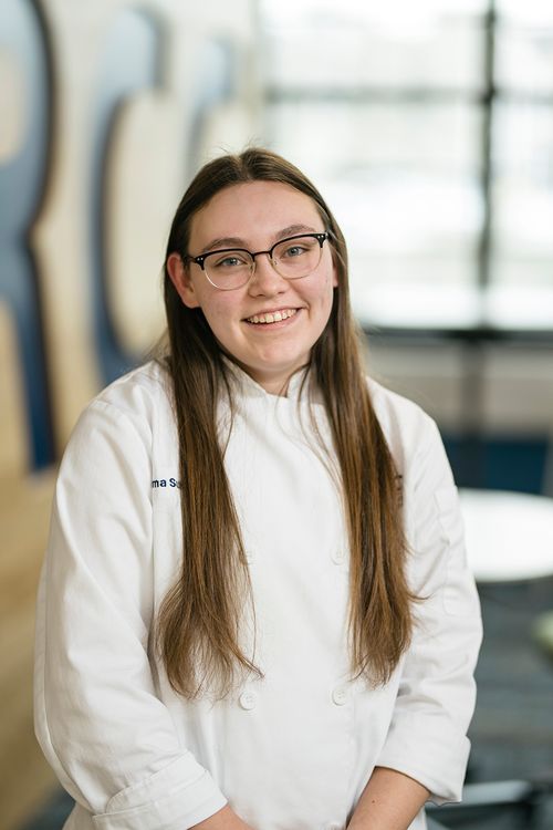 A portrait of Emma Sutherland, owner and baker of Emma's Confections in Grand Rapids MI.