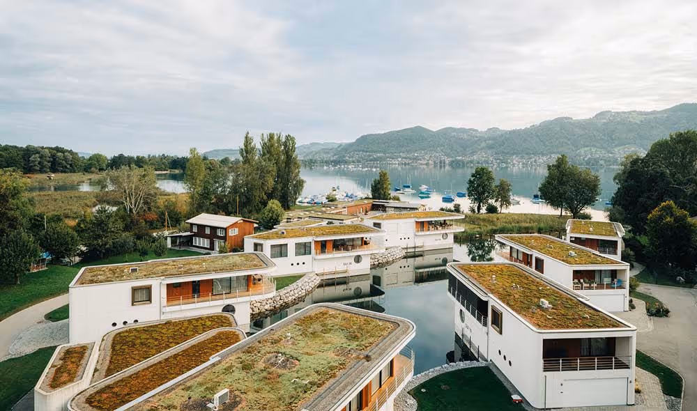 Aerial view of the lake villas of the Deltapark Vitalresort on Lake Thun