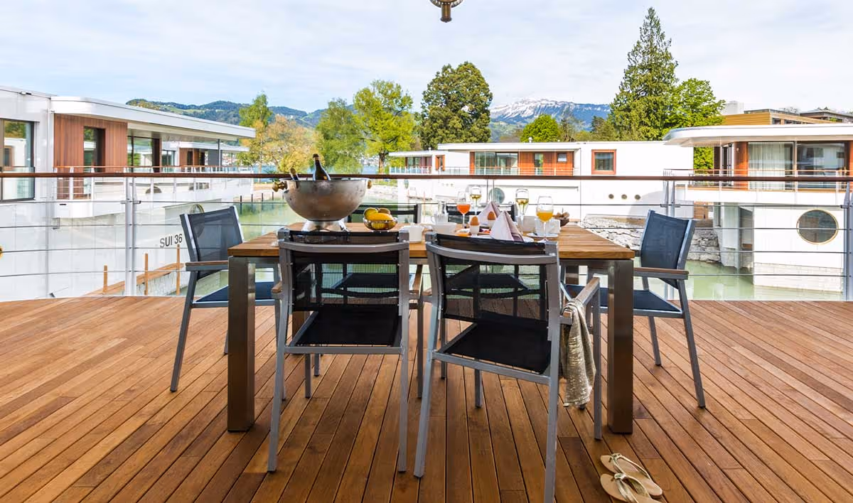 Terrace with dining table at the Seevilla on Lake Thun