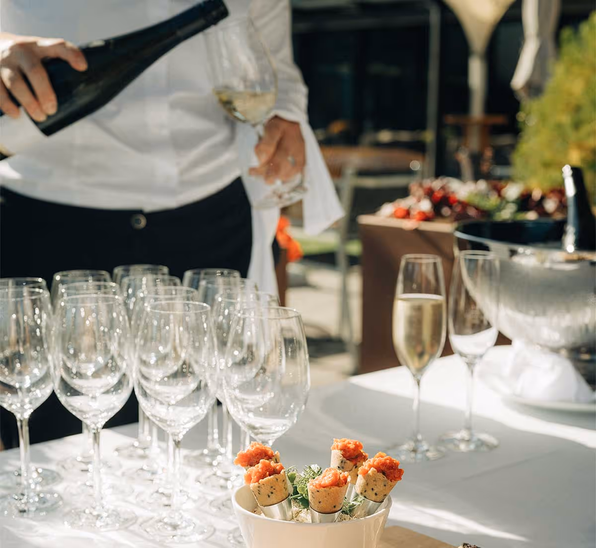 Apeotic with glasses, wine and canapés