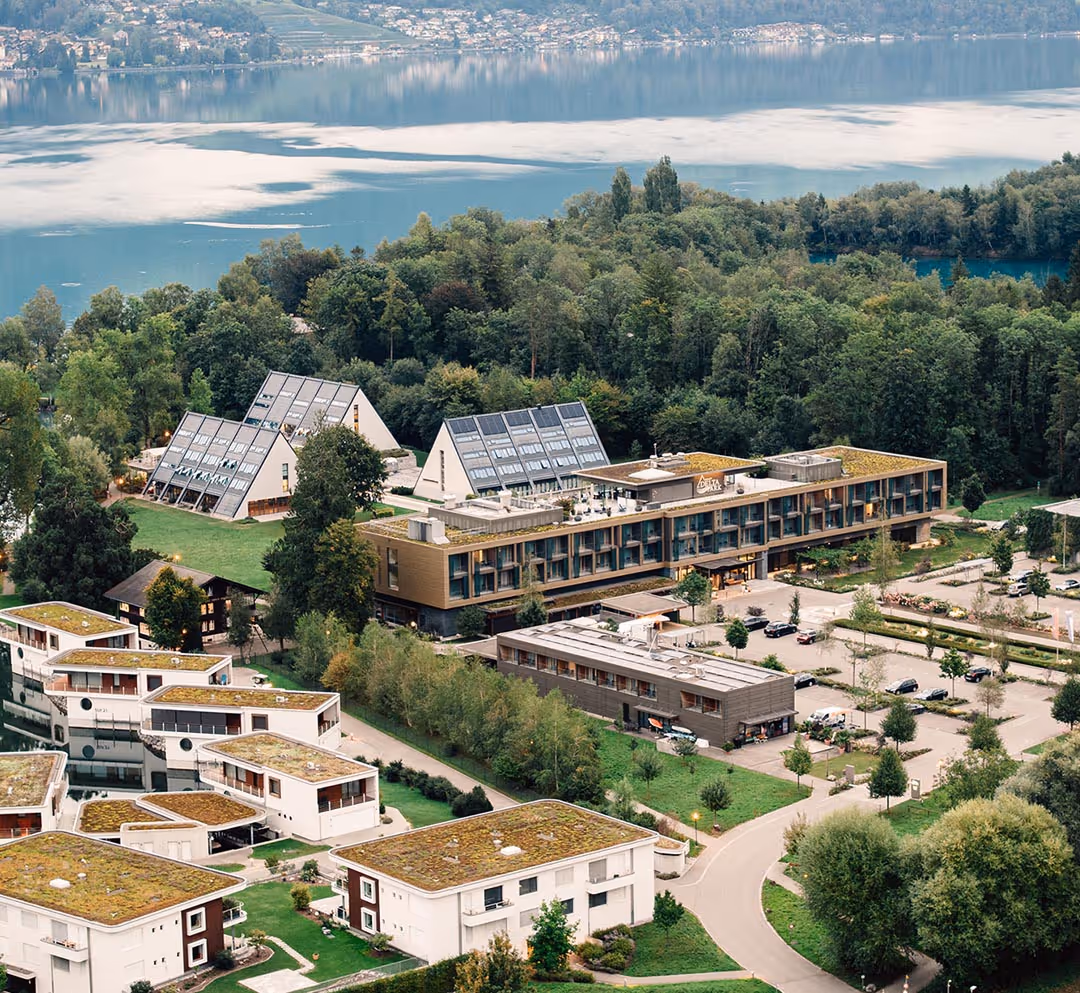 The entire Deltapark Vitalresort with parking lot on Lake Thun