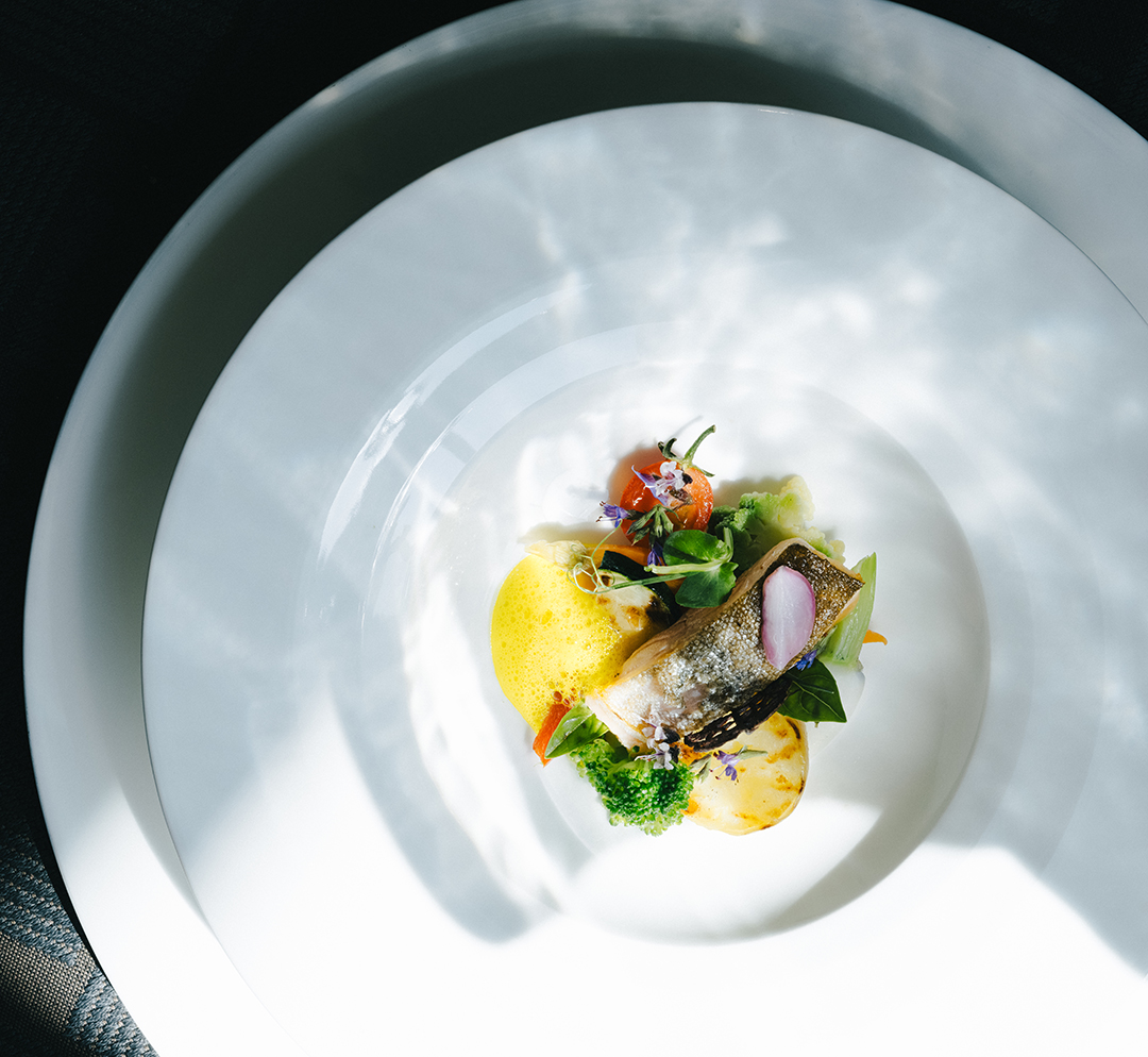 Chef prepares dish