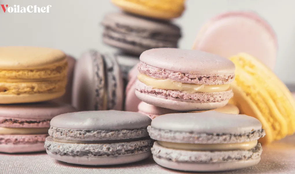 Colourful homemade macarons filled with ganache