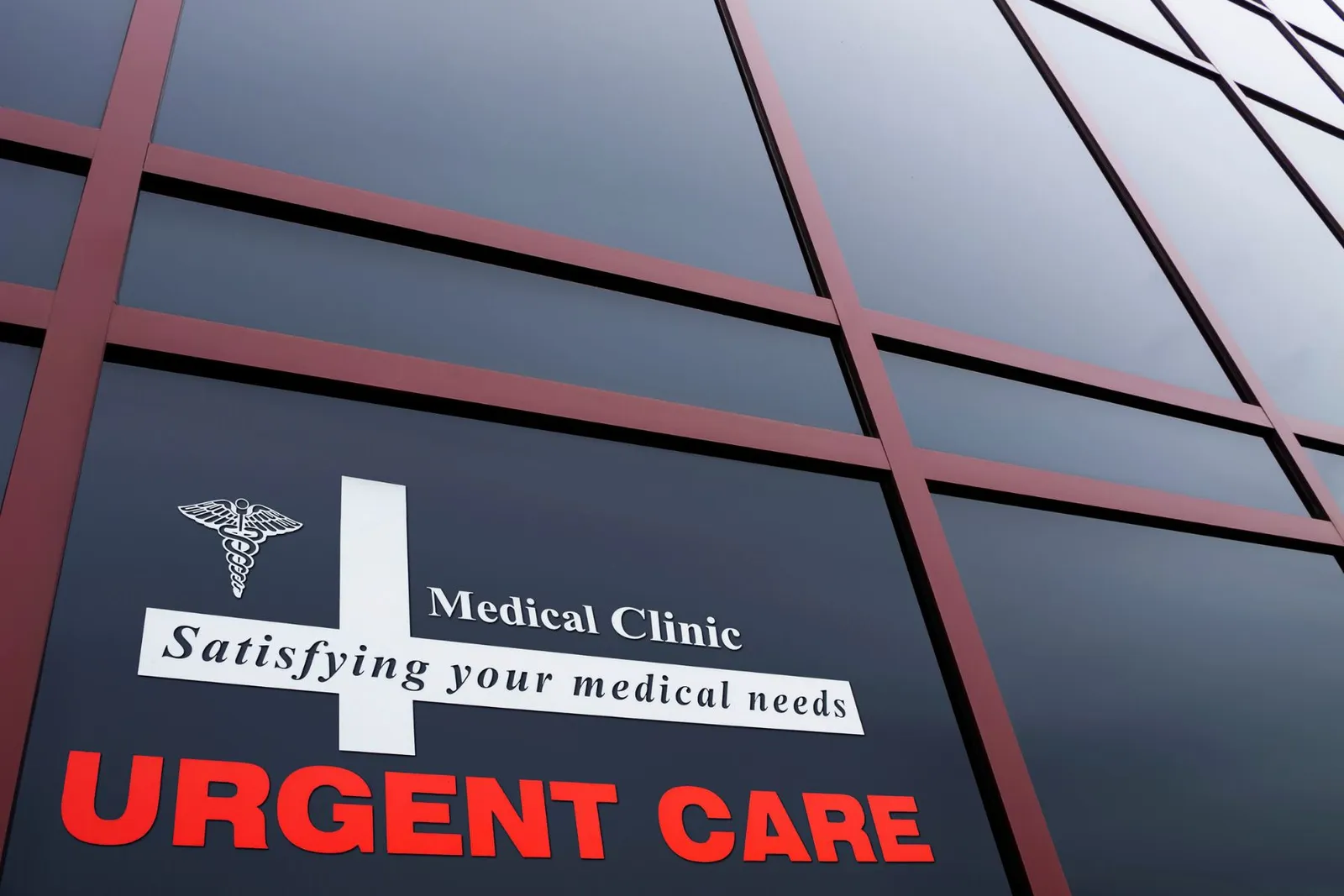Urgent care medical clinic sign on a building