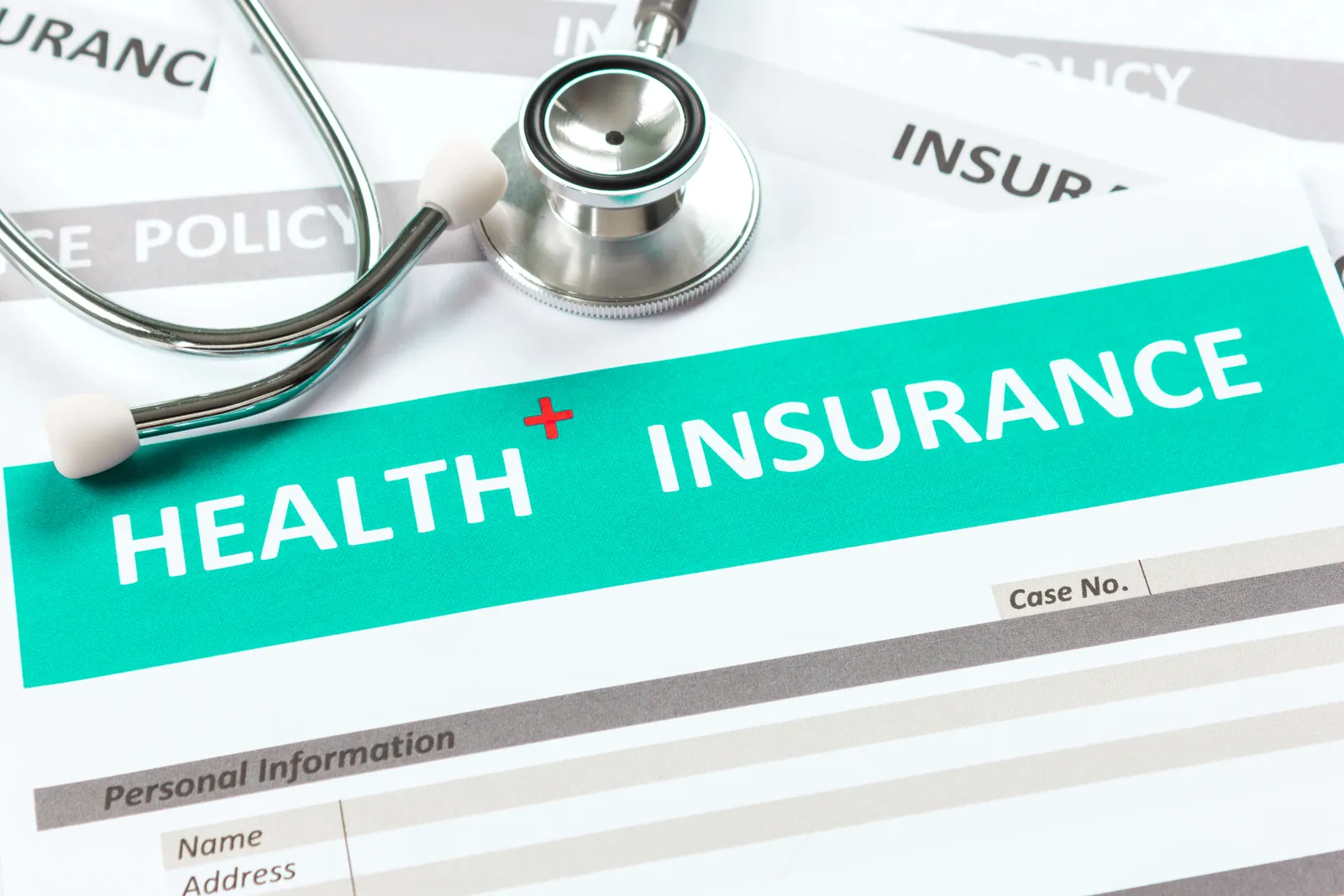 Health insurance policy form with a stethoscope
