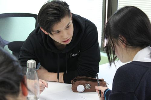 HSC maths tutor helping student 1-on-1 with a question