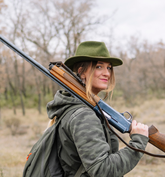 Woman at shooting club after completing online membership payment — SquadSpot