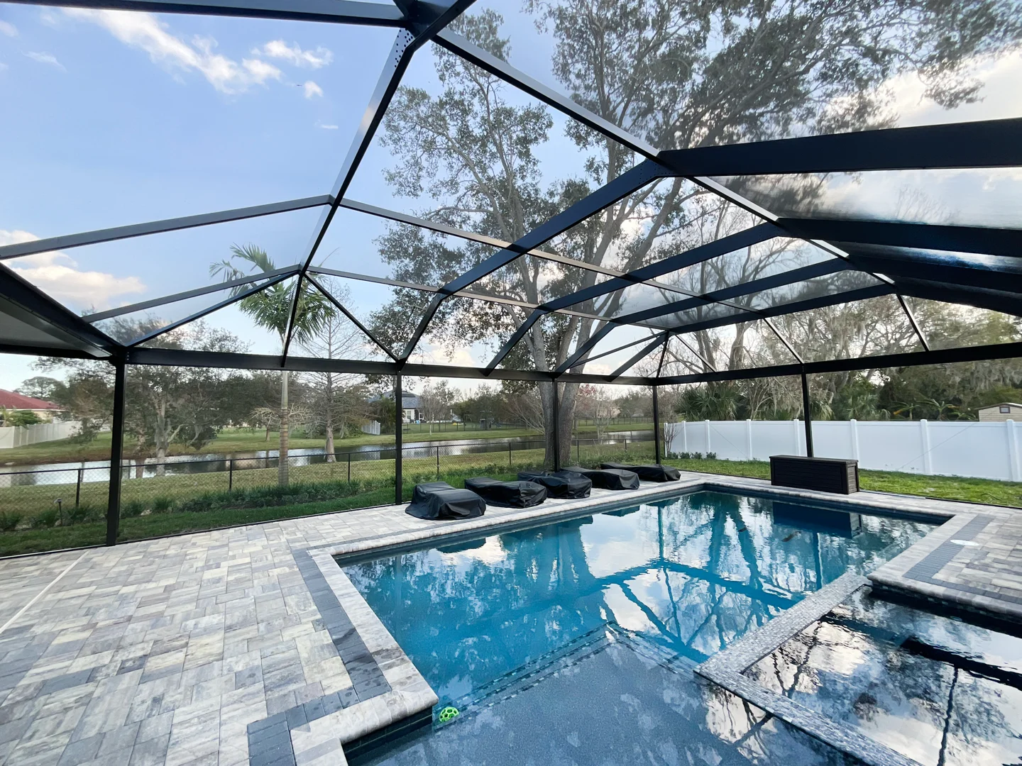 A comparison of different above ground pool enclosure styles including domes, retractable systems, and full screen rooms A comparison of different above ground pool enclosure styles including domes, retractable systems, and full screen rooms
