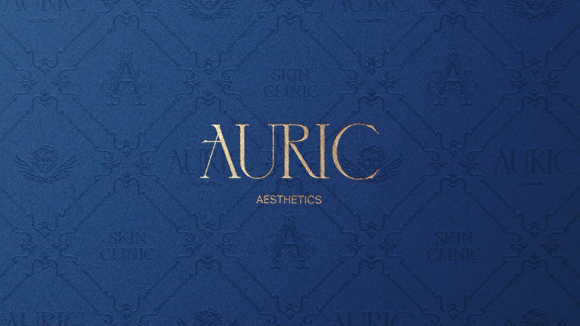 Auric Aesthetics logo on brand pattern — gold lettering on deep navy