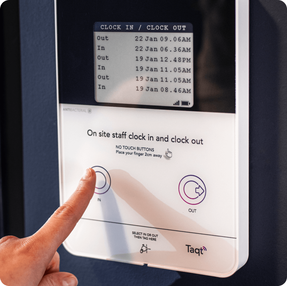 A photo of a person using a TaqtOne to clock in as proof of presence