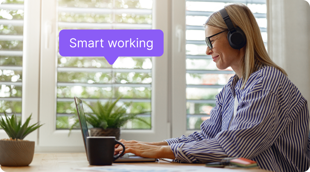Woman working from home planning smart working with farBooking