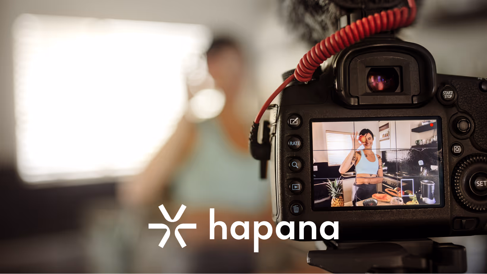 Fitness coach filming a smoothie recipe video