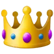 A yellow crown with purple dots on it.