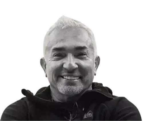 a man with a beard and a black hoodie