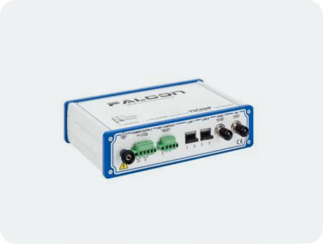 Falcon electronic device with multiple ports including LAN and power supply connectors, in a white and blue casing.