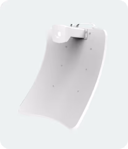 White curved satellite communication antenna with mounting hardware on a light background.