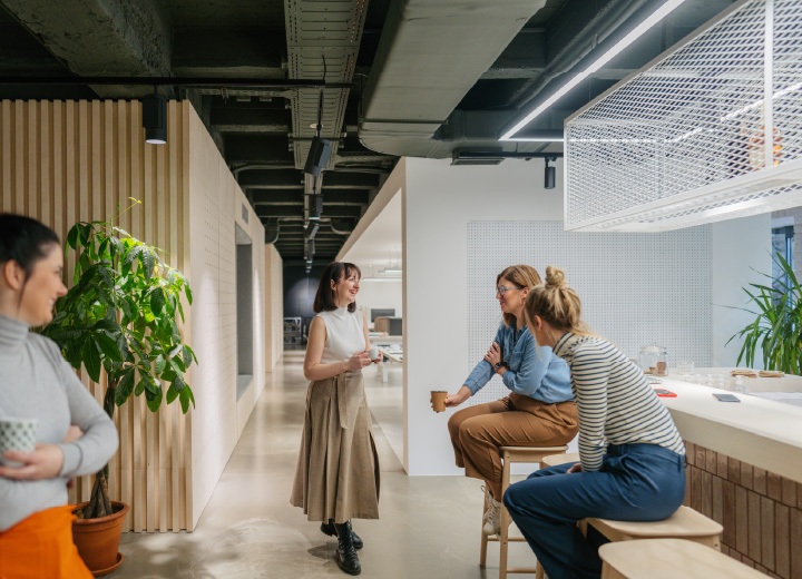 People collaborating in kitchen