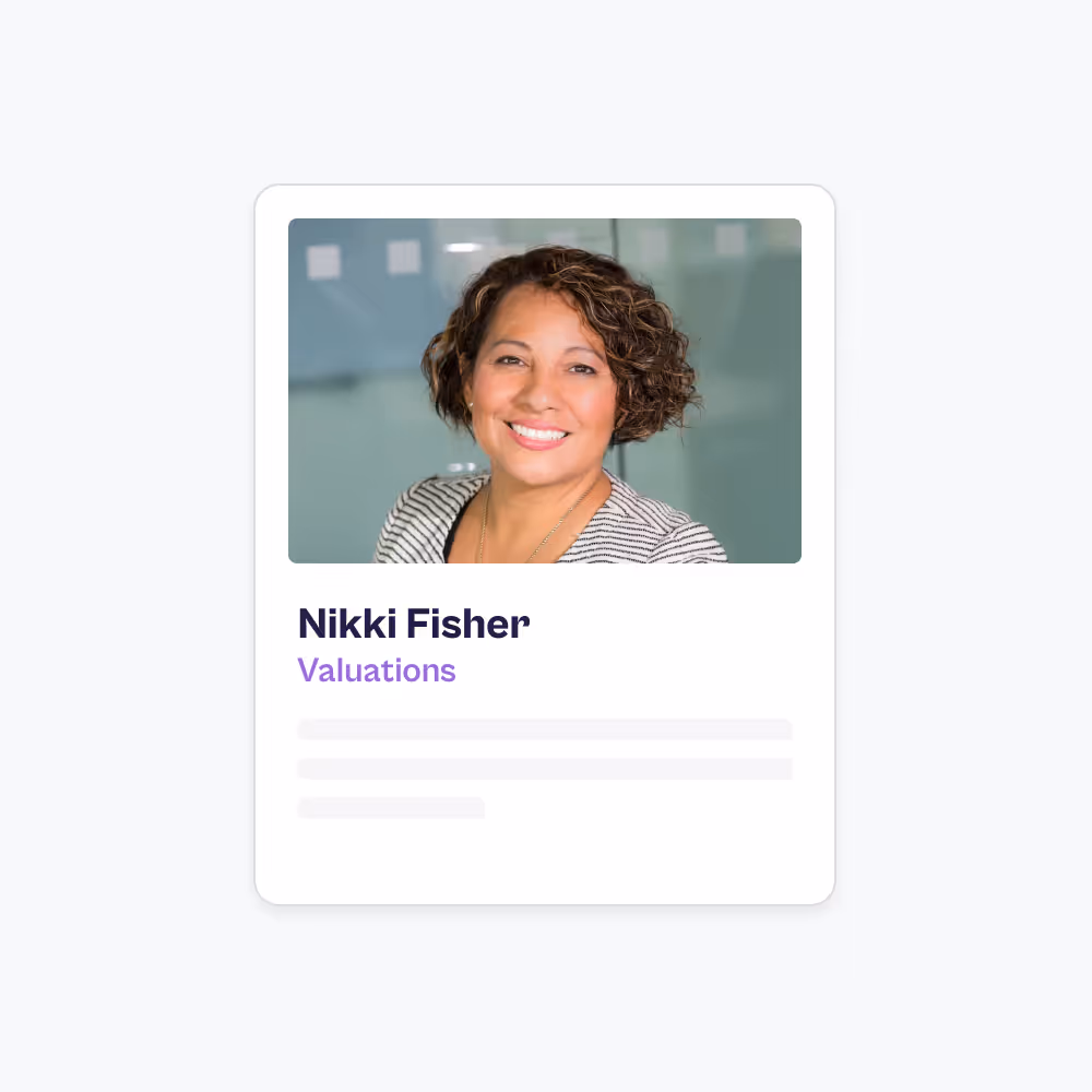 Headshot of smiling woman with short curly hair wearing a striped blazer, labeled Nikki Fisher, Valuations.