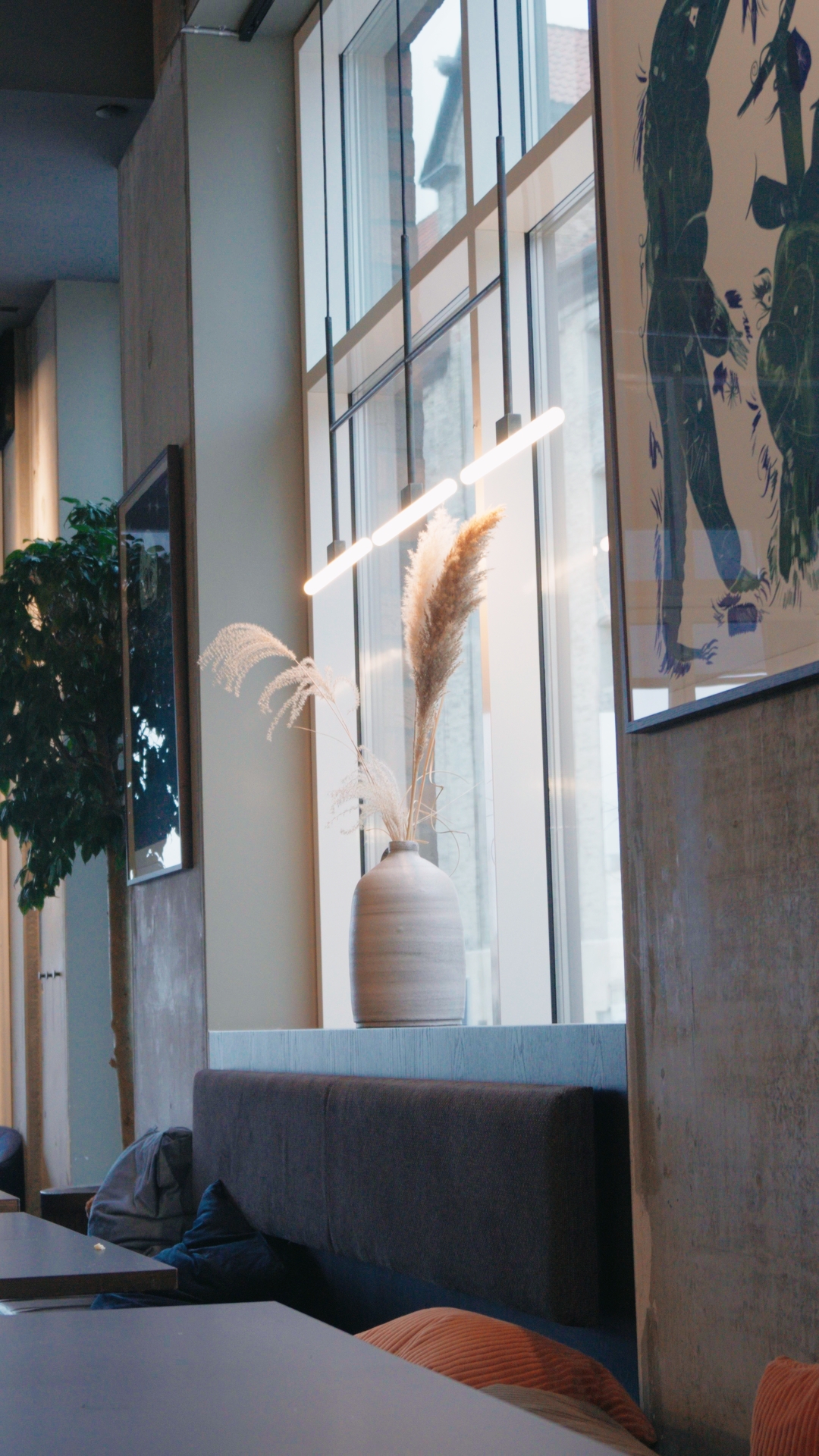 Close-up of glassware in warm restaurant lighting
